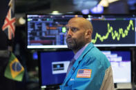 Stock trader Meric Greenbaum monitors stocks prior to the open of trading at the New York Stock Exchange, Wednesday, Sept. 18, 2019. The Federal Reserve is expected to announce its benchmark interest rate later in the day. (AP Photo/Mark Lennihan)