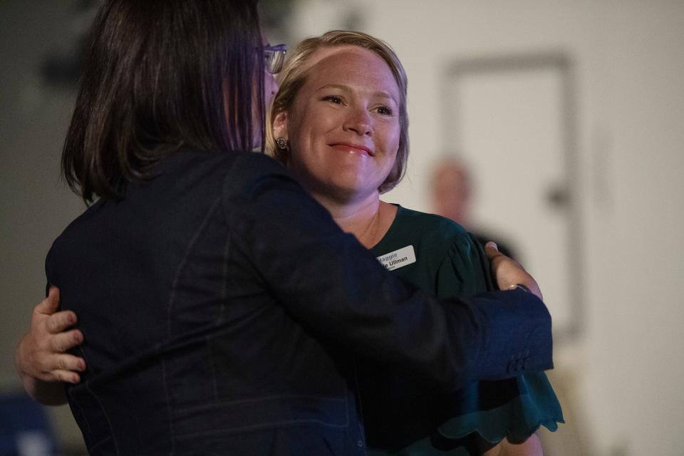 Maggie Ullman Berthiaume, right, is congratulated by fellow City Council candidate Allison Scott following the results of the Democratic primary May 17, 2022.