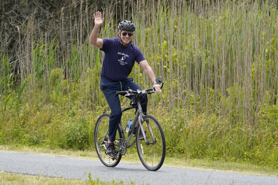 President Joe Biden, with first lady Jill Biden, not shown, takes a bike ride in Rehoboth Beach, Del., Thursday, June 3, 2021. The Biden's are spending a few days in Rehoboth Beach to celebrate first lady Jill Biden's 70th birthday. (AP Photo/Susan Walsh)