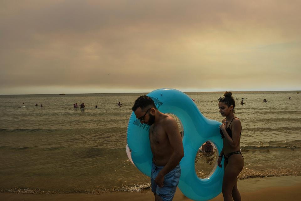 People on a beach in Manavgat, Antalya, Turkey (AP)