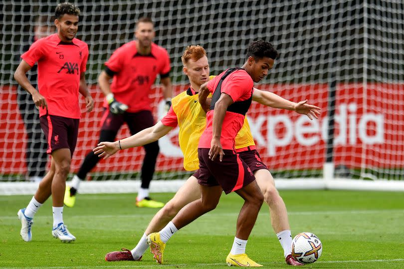 Sepp van den Berg and Fabio Carvalho of Liverpool during a training session at AXA Training Centre