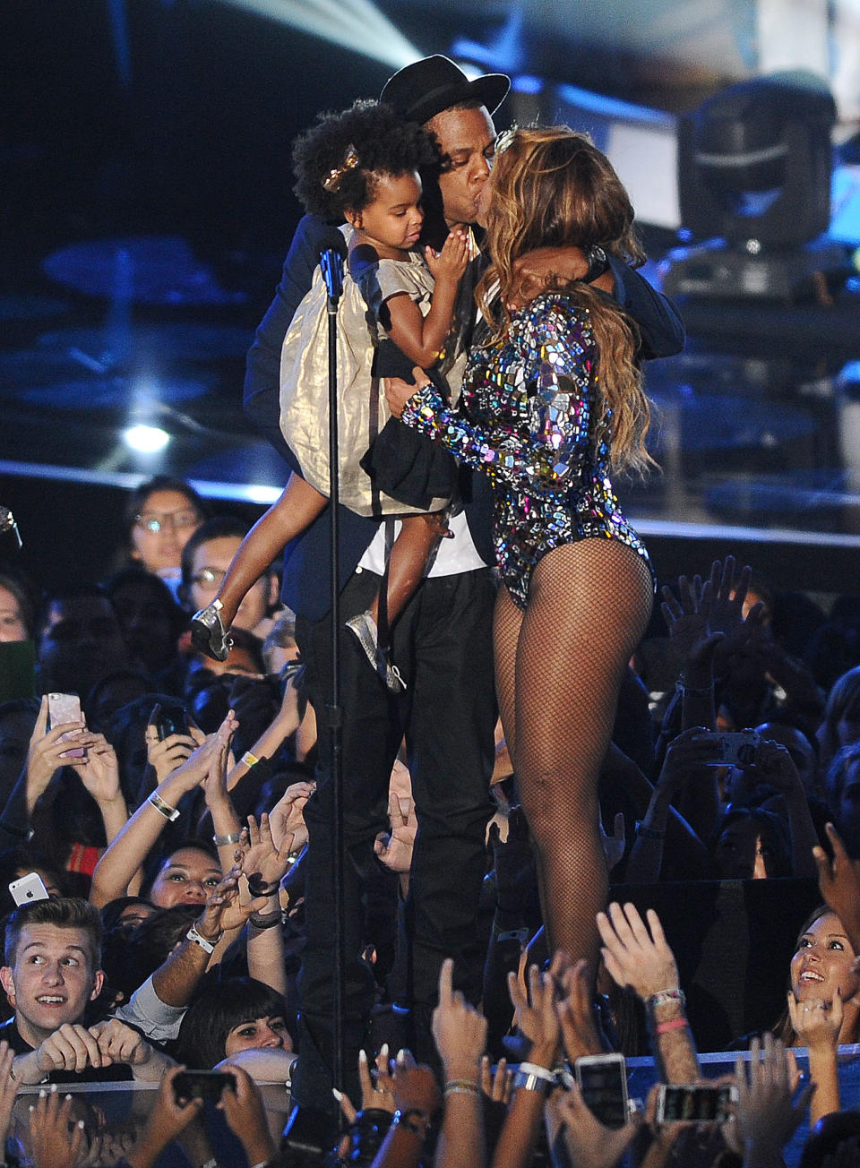 Beyonce, Jay-Z, and Blue Ivy on stage at the 2014 MTV Video Music Awards. (Photo: Getty Images)