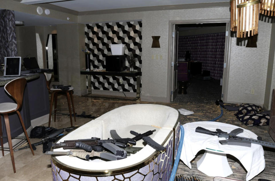 FILE - This Oct. 2017 file photo released by the Las Vegas Metropolitan Police Department Force Investigation Team Report shows the interior of Las Vegas shooter Stephen Paddock's 32nd floor room of the Mandalay Bay hotel. The gunman who killed 58 people from his Las Vegas hotel room two years ago possessed a dozen 100-round magazines that helped him squeeze off 10 rounds per second onto a crowd of concert-goers. High-capacity magazines have been a common denominator in several mass killings in recent years, and lawmakers are making a renewed push to ban them. Nine states have passed laws restricting magazine capacity to 10 to 15 bullets, and the Democratic-led Congress is returning early from its summer recess this week to consider a similar ban at the federal level. (Las Vegas Metropolitan Police Department via AP, File)
