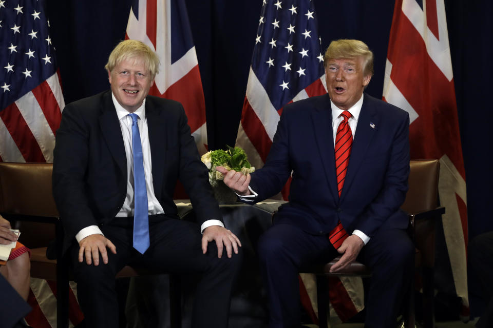 FILE - President Donald Trump meets with British Prime Minister Boris Johnson at the United Nations General Assembly, Tuesday, Sept. 24, 2019, in New York. Boris Johnson and Donald Trump have quite a bit in common as two populist iconoclasts in hot water after leaving the top office in their respective nations. But they are likely on different trajectories. Trump is the frontrunner for his party's presidential nomination and stands a solid chance of winning back his old job from President Joe Biden in 2024. Johnson is a man without a party with a less direct route back to power in the United Kingdom. (AP Photo/Evan Vucci, File)