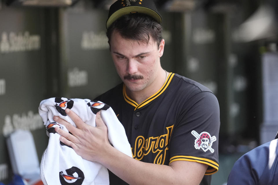 Pittsburgh Pirates starting pitcher Paul Skenes walks through the dugout during the fifth inning of a baseball game against the Chicago Cubs Friday, May 17, 2024, in Chicago. (AP Photo/Charles Rex Arbogast)