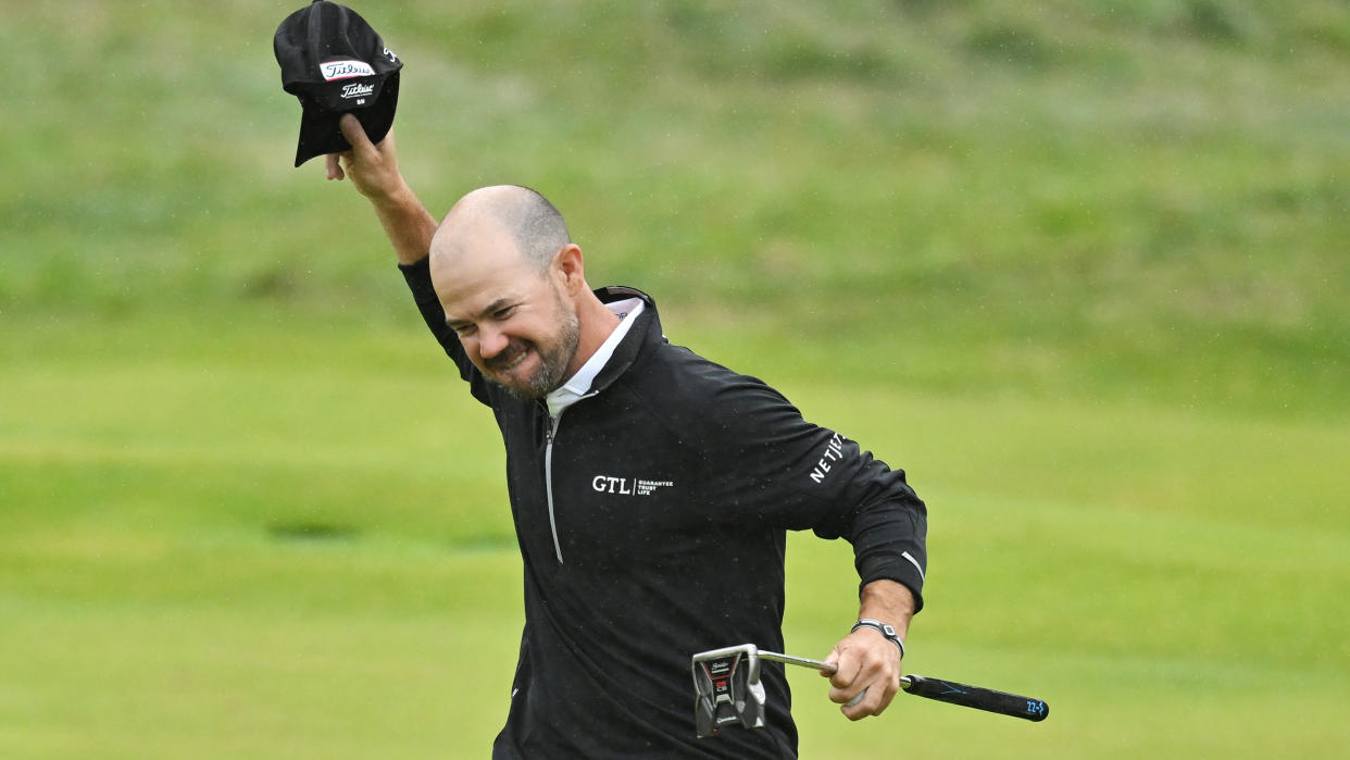  Brian Harman of the United States celebrates on the 18th green after victory on Day Four of The 151st Open at Royal Liverpool Golf Club 