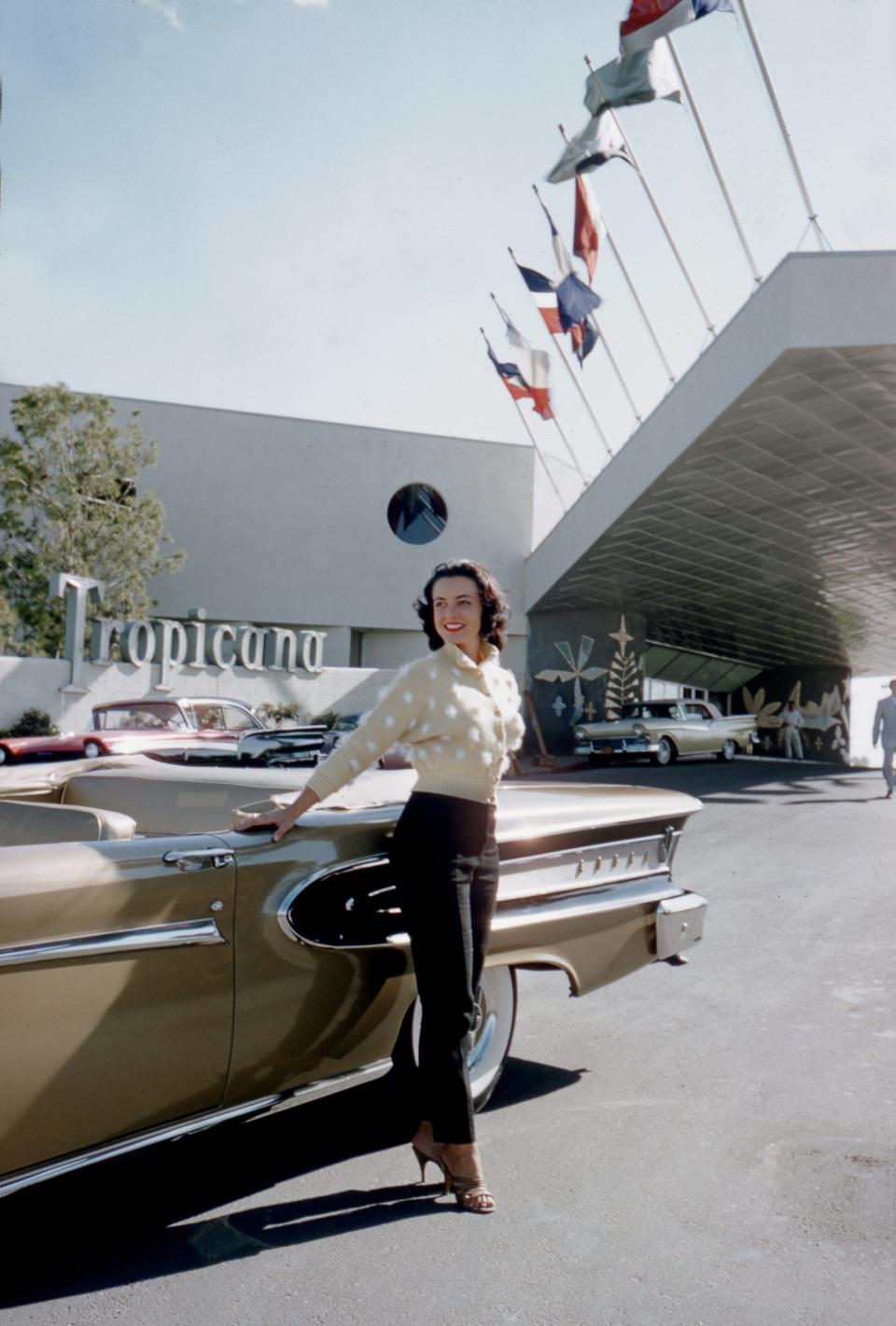 Actress and model Kitty Dolan poses next to a 1958 Ford Edsel Citation outside The Tropicana Hotel in 1958 in Las Vegas.
