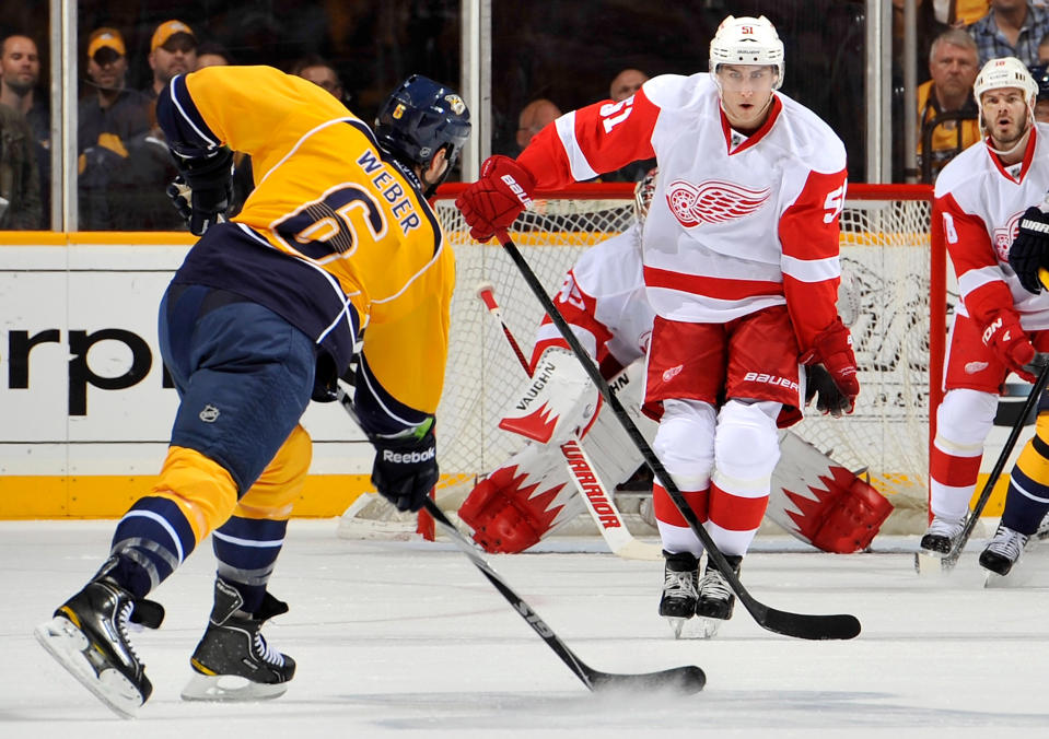 NASHVILLE, TN - APRIL 20: Shea Weber #6 of the Nashville Predators fires a slapshot toward Valtteri Filppula #51 of the Detroit Red Wings in Game Five of the Western Conference Quarterfinals during the 2012 NHL Stanley Cup Playoffs at the Bridgestone Arena on April 20, 2012 in Nashville, Tennessee. (Photo by Frederick Breedon/Getty Images)