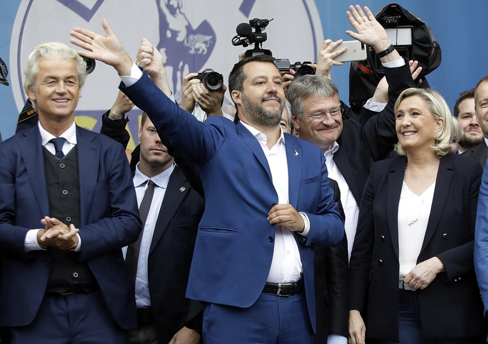 FILE - From left, Geert Wilders, leader of Dutch Party for Freedom, Matteo Salvini, Jörg Meuthen, leader of Alternative For Germany party, and Marine Le Pen, attend a rally organized by League leader Matteo Salvini, with leaders of other European nationalist parties, ahead of the May 23-26 European Parliamentary elections, in Milan, Italy, Saturday, May 18, 2019. In June, voters in the 27 member states of the European Union will elect their next Parliament for a five-year term. Analysts say that far-right parties, now the sixth-largest group in the assembly, are primed to gain seats – and more influence over EU policies affecting everything from civil rights to gender issues to immigration. (AP Photo/Luca Bruno, File)