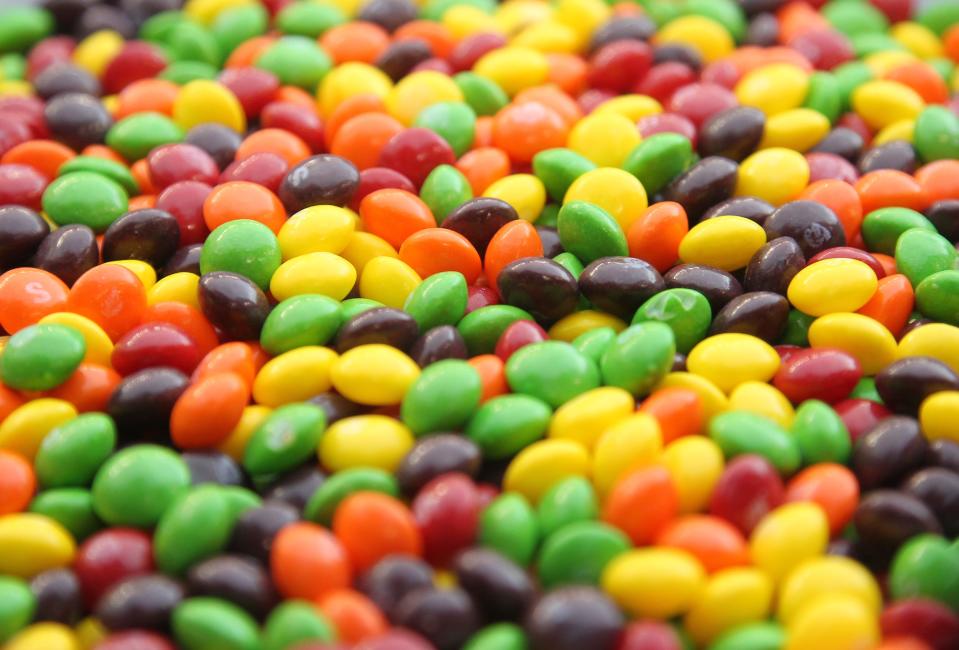 A closeup of a bowl of Skittles, the true breakfast of champions.