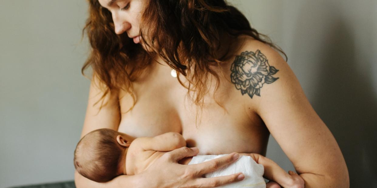 mother breastfeeding new baby - what moms really want for mother's day