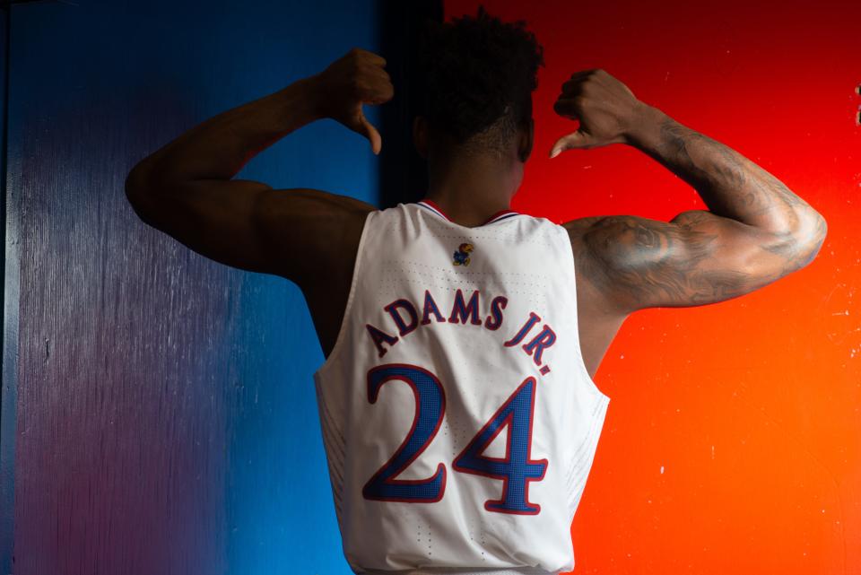 Kansas forward KJ Adams Jr. poses inside Allen Fieldhouse for media day last November.