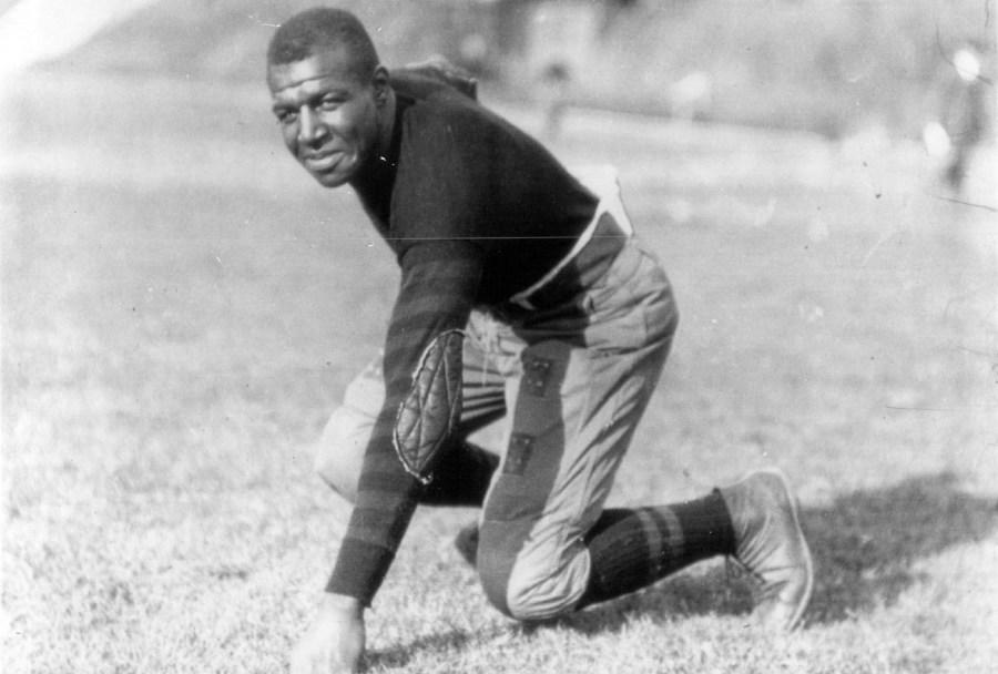 Iowa football player Frederick “Duke” Slater poses for a photo in 1921. Slater was the NFL’s first African-American lineman, and often the only Black player on the field. After retiring, he broke down more racial barriers to become a judge in Chicago. (Chicago Sun-Times via AP)