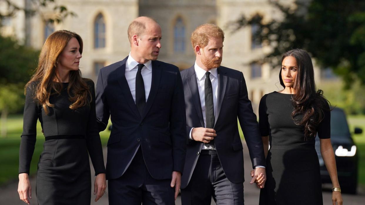 the prince and princess of wales accompanied by the duke and duchess of sussex greet wellwishers outside windsor castle