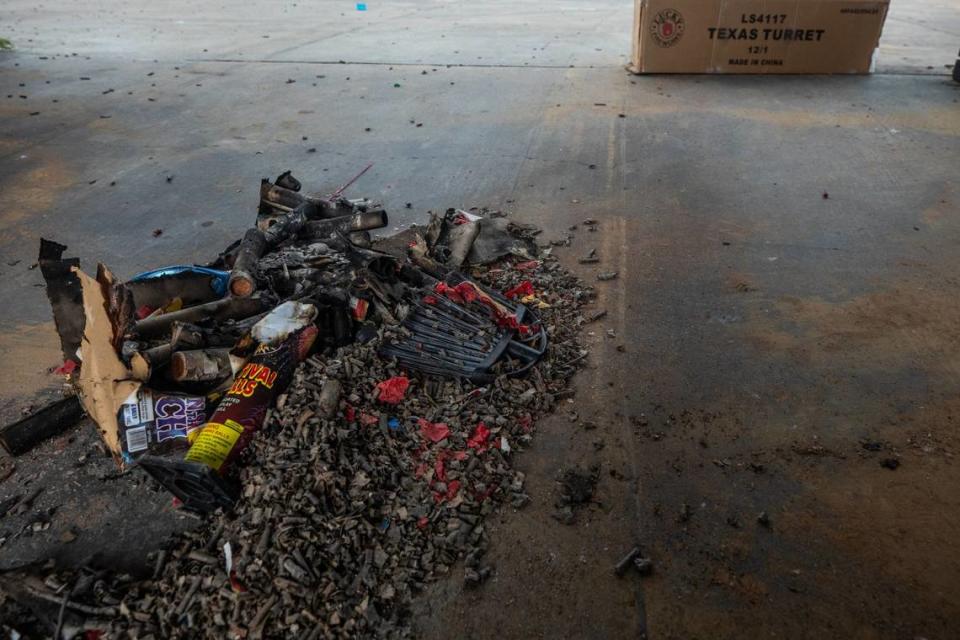 A pile of firework debris in one of the lots of the Crystal Car Wash on Friday, July 5, 2024 in Fort Worth. A fatal shooting took place the night prior.