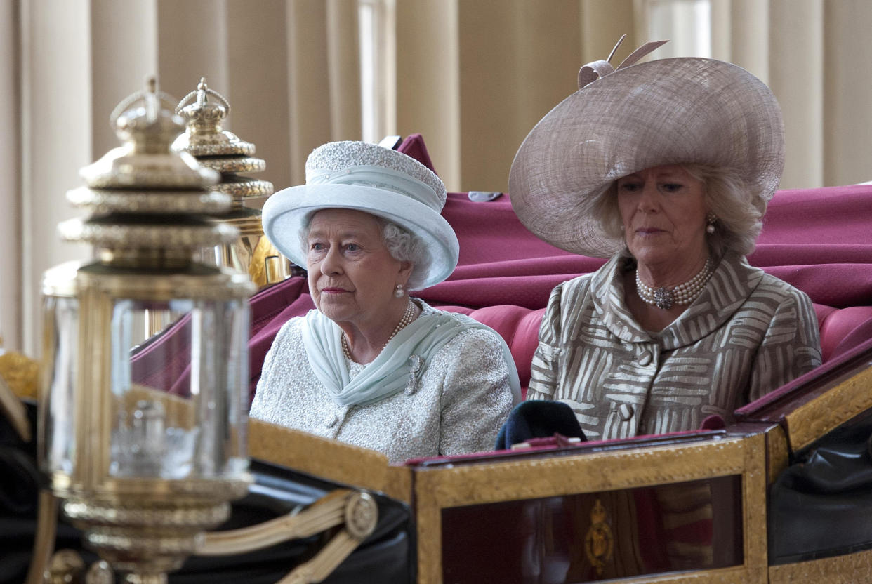 EMBARGOED TO 2200 SATURDAY FEBRUARY 5 File photo dated 5/6/2012 of Queen Elizabeth II and the Duchess of Cornwall arrive in the 1902 State Landau coach at Buckingham Palace at the end of a carriage procession following a National Service of Thanksgiving and a Lunch in honour of her Diamond Jubilee. The Queen has used her Platinum Jubilee message to the nation to back the Duchess of Cornwall as Queen Camilla, shaping the future of the monarchy on her historic milestone. Issue date: Saturday February 5, 2022.