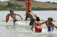 "Premiere - Erik Reichenbach, Shamar Thomas, Julia Landauer and Dawn Meehan compete during the premiere episode of "Survivor: Caramoan - Fans vs. Favorites." The Emmy Award-winning series returns for its 26th season with a special 90-minute premiere on CBS.
