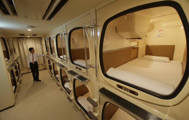 Squeezing Into A Capsule Hotel Room In Japan 