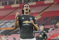 Manchester United's Edinson Cavani celebrates after scoring his side's second goal during an English Premier League soccer match between Southampton and Manchester United at the St. Mary's stadium in Southampton, England, Sunday, Nov. 29, 2020. (Mike Hewitt, Pool via AP)