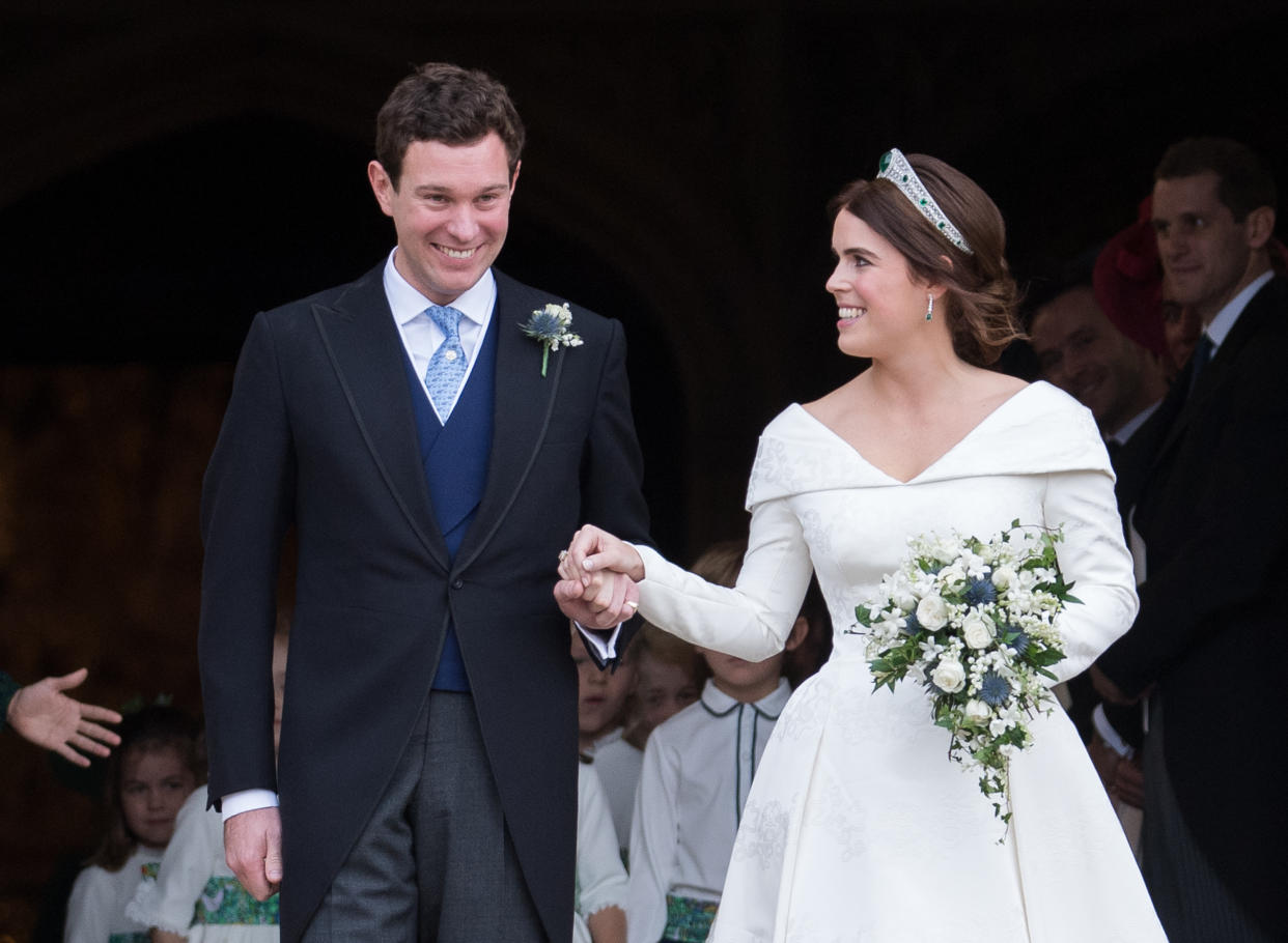 WINDSOR, ENGLAND - OCTOBER 12:  Princess Eugenie of York and Jack Brooksbank leave St George's Chapel in Windsor Castle following their wedding at St. George's Chapel on October 12, 2018 in Windsor, England.  (Photo by Pool/Samir Hussein/WireImage)