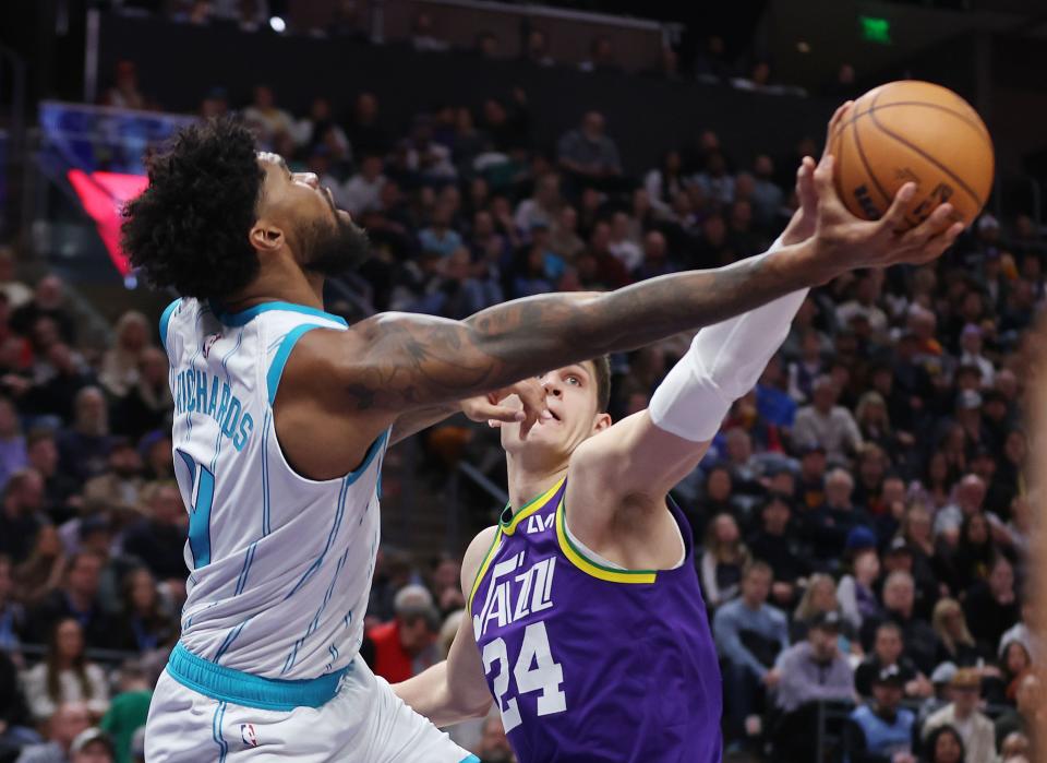 Utah Jazz center Walker Kessler (24) defends Charlotte Hornets center Nick Richards (4) in Salt Lake City on Thursday, Feb. 22, 2024. | Jeffrey D. Allred, Deseret News