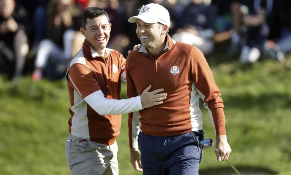 Europe’s Sergio García celebrates with Rory McIlroy after holing a putt on the second day of the 2018 Ryder Cup