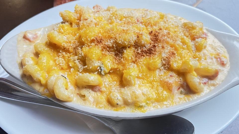 At Carsons Tavern in Stuart, the mac & cheese is a spicy mix of cheddar, pepper jack, cream cheese, marinated tomatoes, roasted peppers, onions and garlic over rotini pasta.