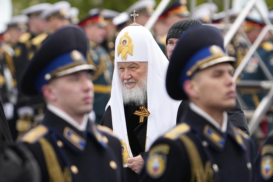 Russian Orthodox Patriarch Kirill, center, arrives to attend the Victory Day military parade in Moscow, Russia, Thursday, May 9, 2024, marking the 79th anniversary of the end of World War II. (AP Photo/Alexander Zemlianichenko)