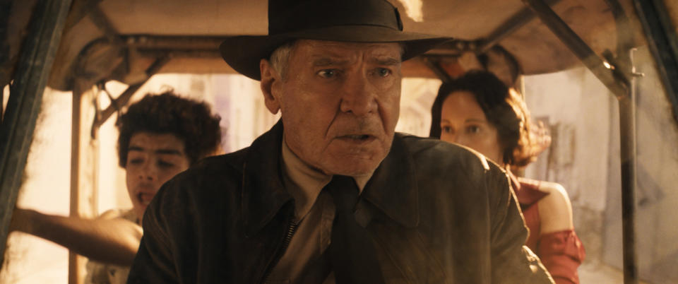 (L-R): Teddy (Ethann Isidore), Indiana Jones (Harrison Ford) and Helena (Phoebe Waller-Bridge) in Lucasfilm's INDIANA JONES AND THE DIAL OF DESTINY. ©2023 Lucasfilm Ltd. & TM. All Rights Reserved.