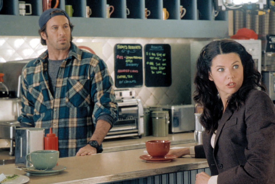 Luke Danes and Lorelai Gilmore in a scene at Luke’s Diner from the TV show "Gilmore Girls."