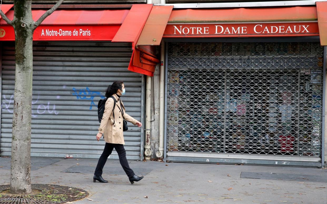 Measures taken by the French government to curb the disease have left many shops and bars closed - Chesnot/Getty Images