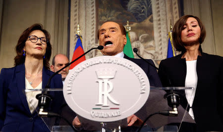 Forza Italia party leader Silvio Berlusconi speaks to the media during the second day of consultations with the Italian President Sergio Mattarella at the Quirinal Palace in Rome, Italy, April 5, 2018. REUTERS/Alessandro Bianchi