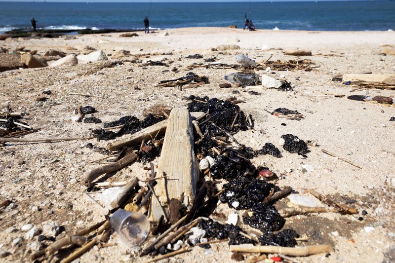 FILE PHOTO: Israel's beaches blackened by tar after offshore oil spill