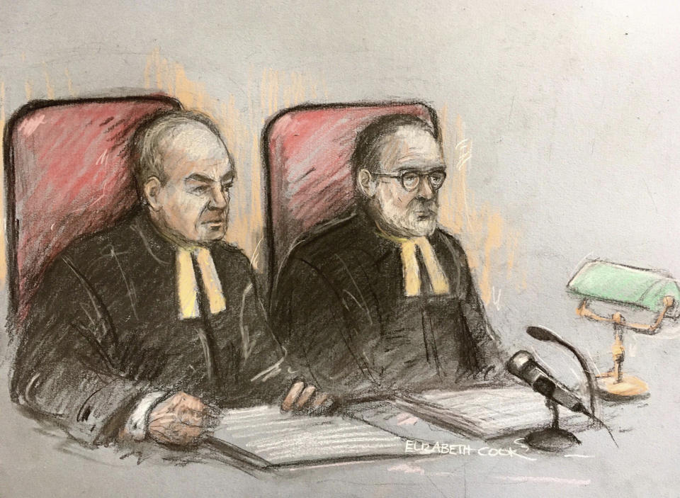 Court artist sketch by Elizabeth Cook, showing Lord Justice Dingemans, left, and Lord Justice Underhill at the Royal Courts of Justice in London, Thursday March 18, 2021, for Johnny Depp's application for permission to appeal against a High Court ruling that he assaulted his ex-wife Amber Heard and put her in fear for her life. (Elizabeth Cook/PA via AP)