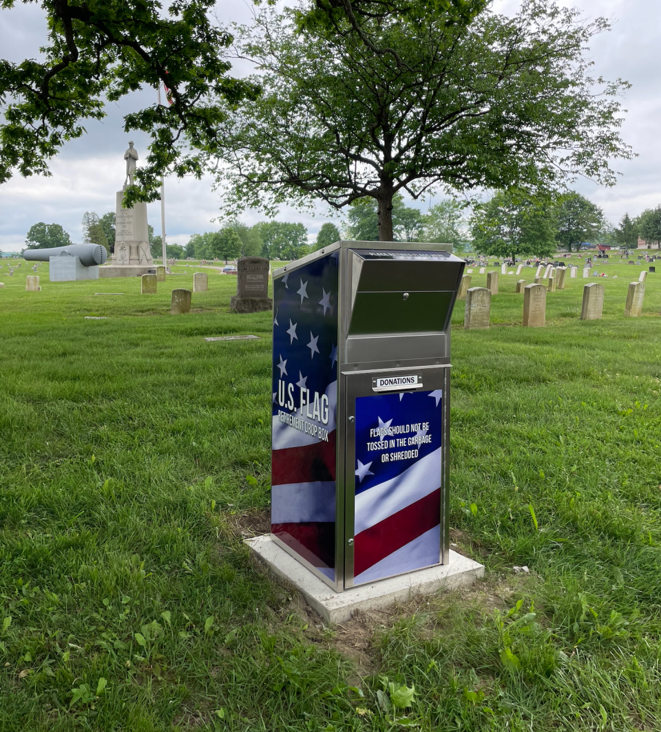The new flag boxes in Greenwood and Woodlawn cemeteries gives visitors a place to properly dispose of their American flags. This flag box at Woodlawn Cemetery is located near the front entrance by the military section.