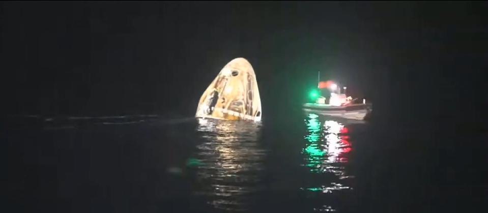 This screen capture from the webcast of NASA's SpaceX Crew-5 return shows the Dragon Endurance spacecraft in the Gulf of Mexico during recovery efforts with a crew of four astronauts on Saturday, March 11.