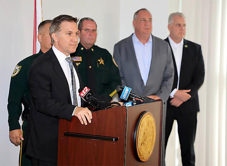 Palm Beach County State Attorney Dave Aronberg and law-enforcement officers discuss criminal charges against those who distribute extremist literature throughout the community at a press conference on Thursday, Nov. 2, 2023.