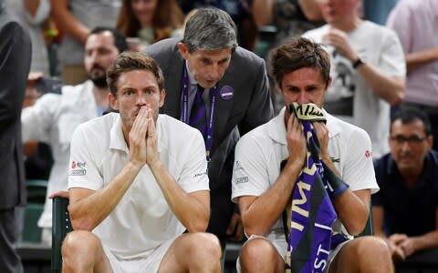 France's Nicolas Mahut and Edouard Roger-Vasselin look dejected after losing the men's doubles final against Colombia's Juan-Sebastian Cabal and Robert Farah. - Credit: Reuters