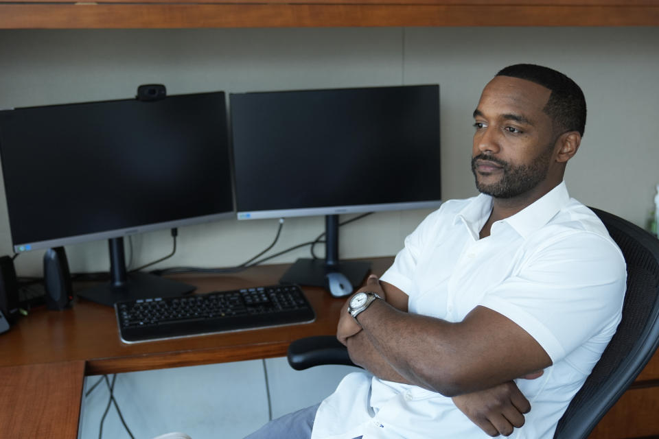 Adrian Perkins, former mayor of Shreveport, La., sits for a portrait in his office in Chicago, Thursday, June 13, 2024. An ad targeting Perkins in his 2022 reelection campaign is believed to be one of the first examples of an AI deepfake deployed in a political race in the U.S. “In politics, people are always going to push the envelope a bit to be effective,” he says. “We had no idea how significant it would be.” (AP Photo/Nam Y. Huh)