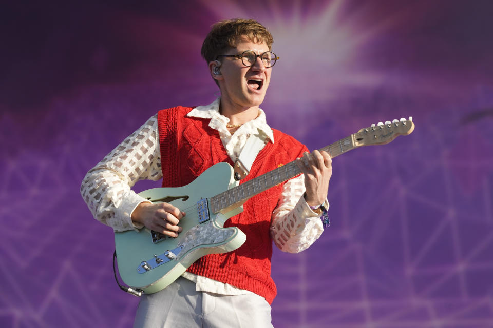 FILE - Dave Bayley of Glass Animals performs at Lollapalooza Music Festival in Chicago on July 29, 2022. The English indie-pop band releases its fourth album on July 19. (Photo by Rob Grabowski/Invision/AP, File)