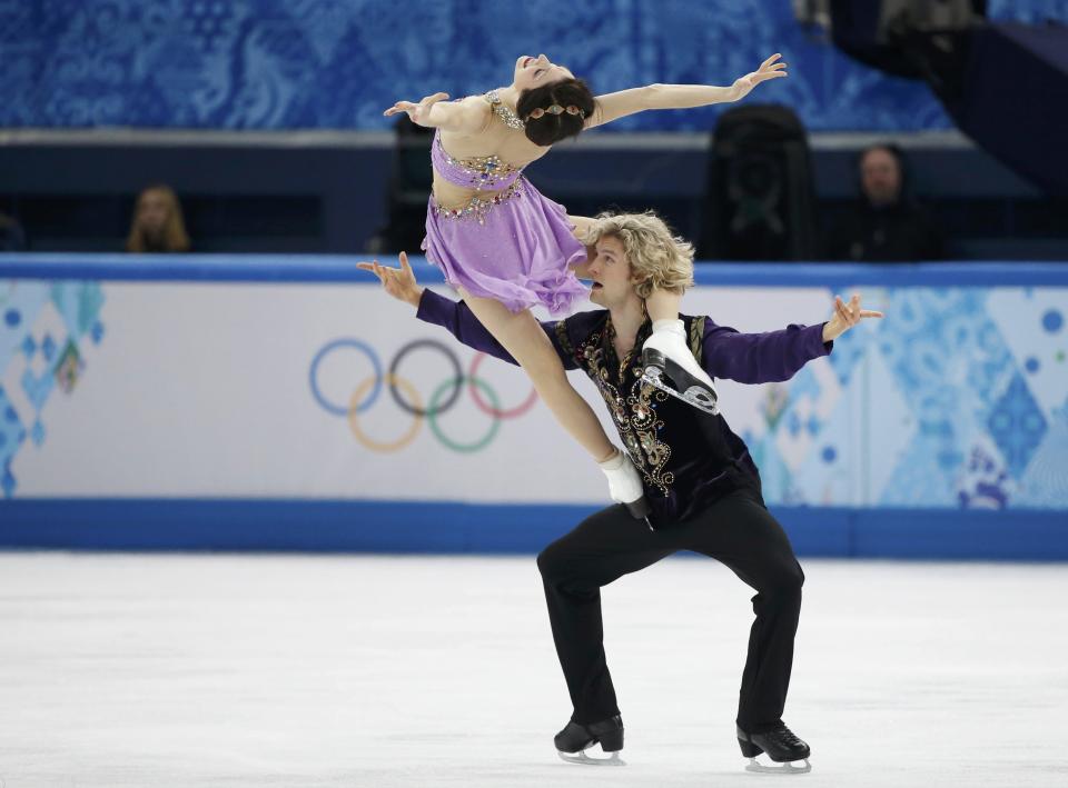 Meryl Davis and Charlie White of the U.S. compete during the figure skating ice dance free dance program at the Sochi 2014 Winter Olympics, February 17, 2014. (REUTERS/Lucy Nicholson)