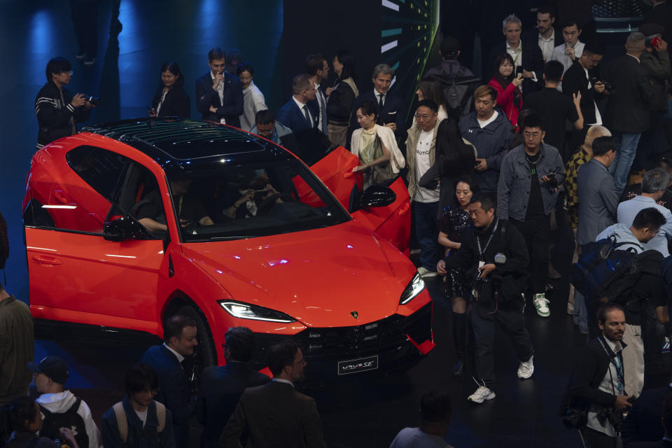 Lamborghini's new plug-in hybrid was recently launched in Canada amid softening demand for luxury cars and trucks. Will rising gas prices move the needle on sales? (AP Photo/Ng Han Guan)