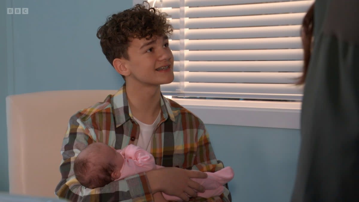 Ricky with baby Charli on ‘EastEnders' (BBC)