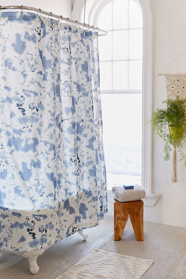 Get it <a href="https://www.urbanoutfitters.com/shop/kishi-shibori-dye-shower-curtain" target="_blank">here</a>.