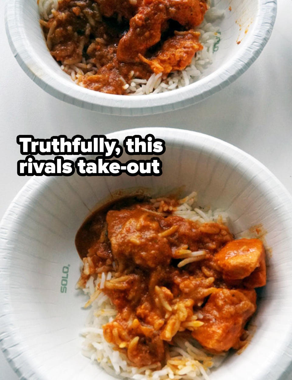 Two bowls of chicken tikka masala