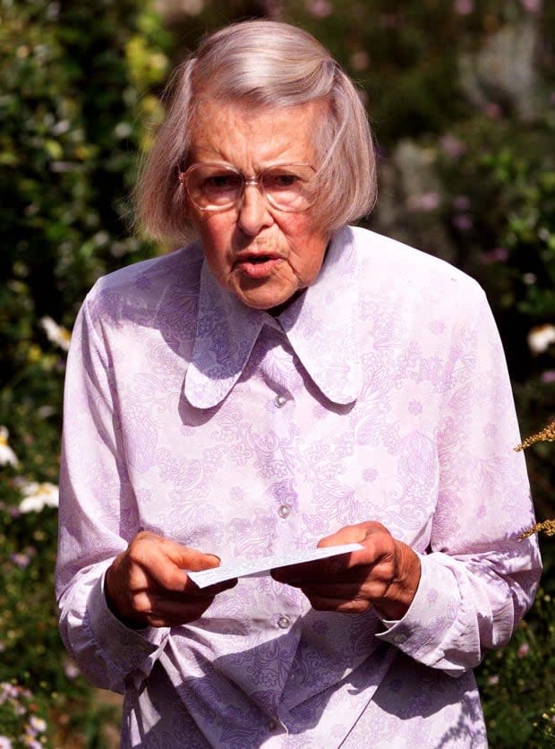 Melita Norwood, then 87, is seen reading a statement to the media, outside of her home in southeast London, in September of 1999. The octogenarian was unmasked as having served as a long-time Soviet spy during the Cold War.