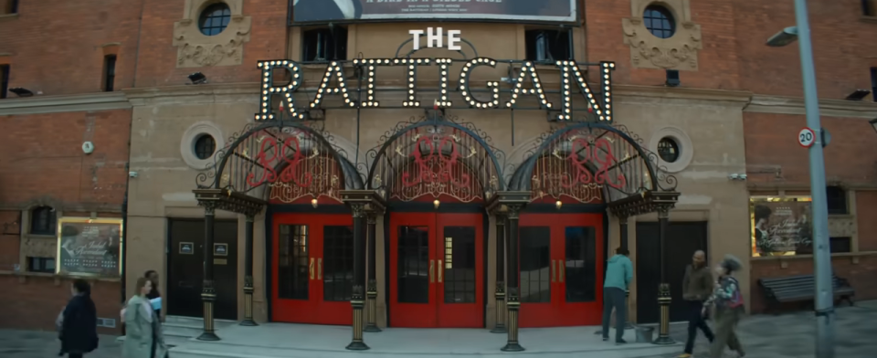 Outside the Rattigan theater, which has a large sign