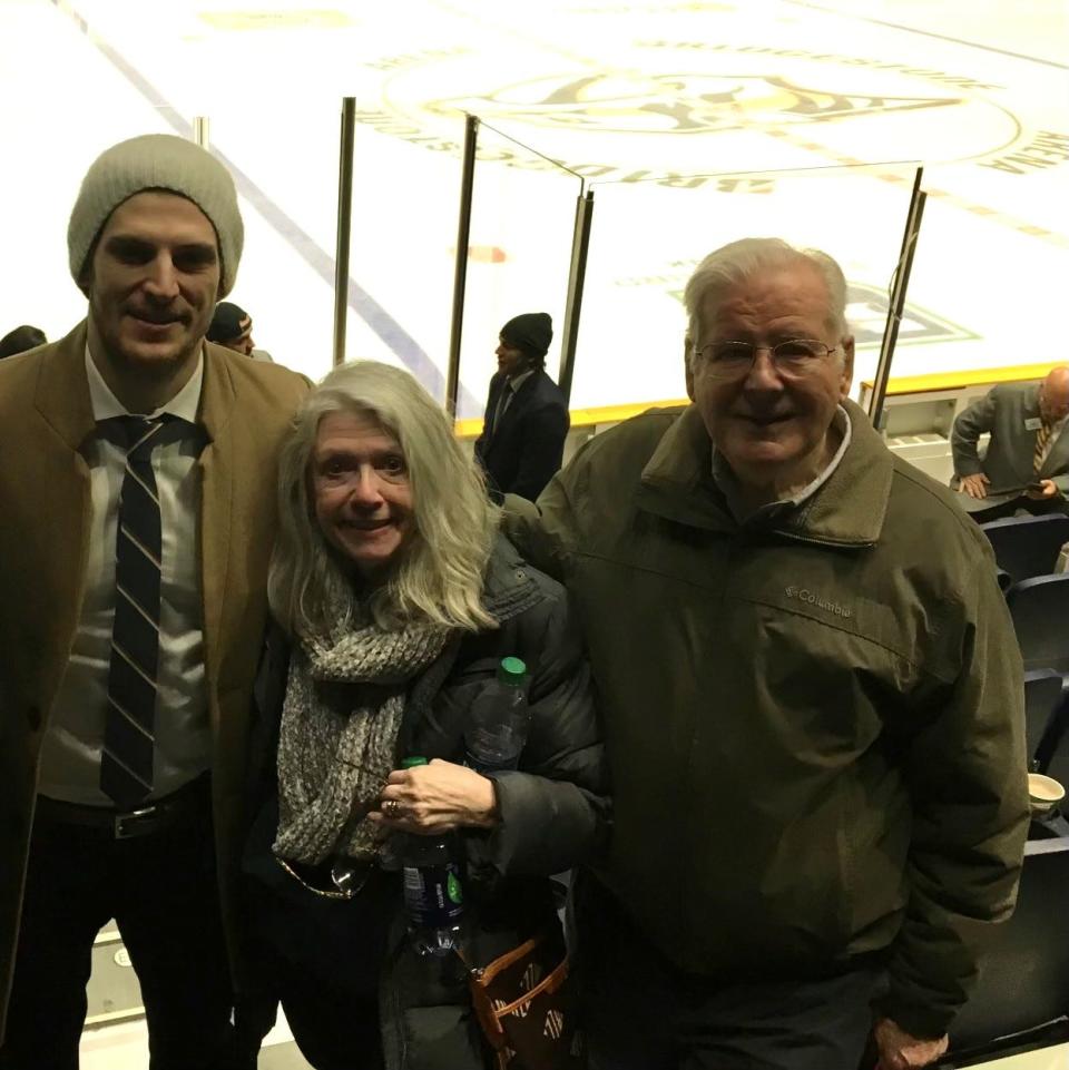 Washington Capitals player Nic Dowd, left, with his parents.