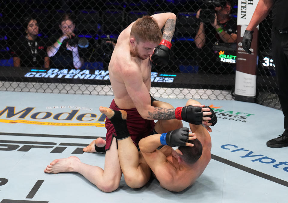 LAS VEGAS, NEVADA – AUGUST 08: (L-R) Tom Nolan of Australia elbows Bogdan Grad of Romania in a lightweight fight during Dana White’s Contender Series season seven, week one at UFC APEX on August 08, 2023 in Las Vegas, Nevada. (Photo by Al Powers/Zuffa LLC)