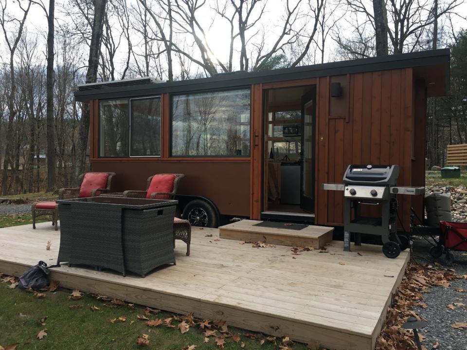 The exterior of a tiny house at Think Big! A Tiny House Resort.
